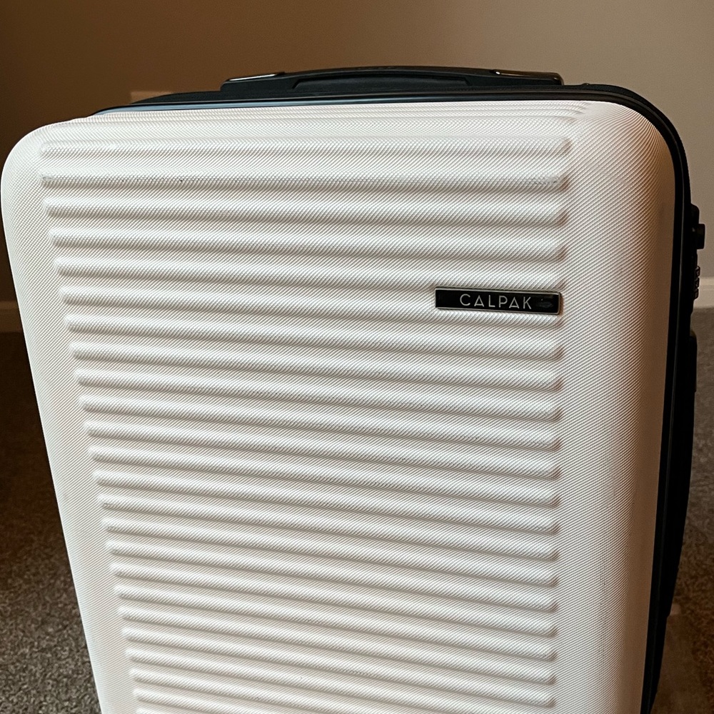 Calpak 21 inch Hard Side Carry On Spinner